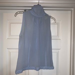 Sleeveless silk shirt
